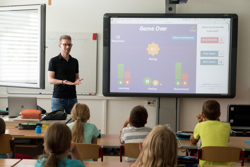 teacher and students in a modern classroom